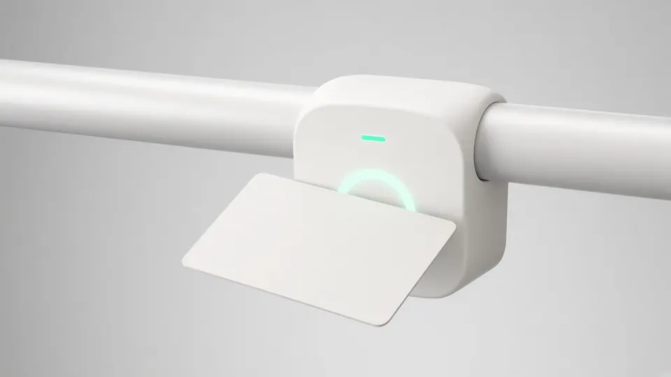RFID card reader on a school bus handrail